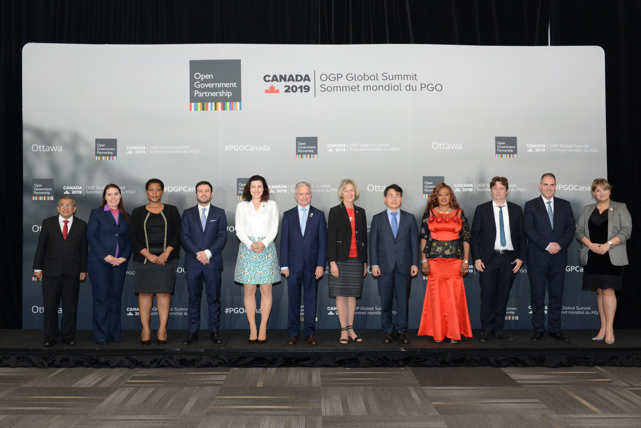 Government representatives posing for a group picture at the OGP Global Summit 2019 in Ottawa